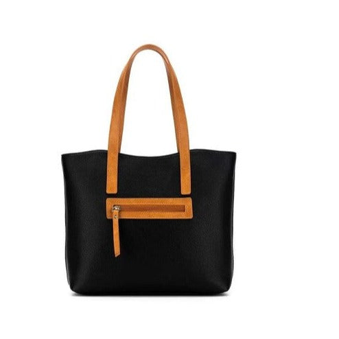 black handbag with tan strap