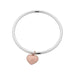 silver bangle with rose gold heart charm by liberte