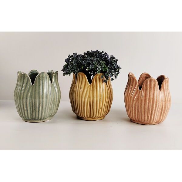 Three Flower shaped planter pots in different colours