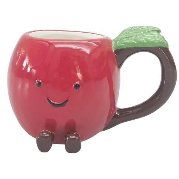 Red mug shaped like a cartoon apple with a green leaf handle 