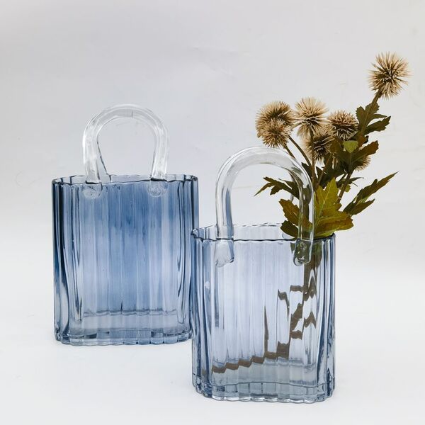 blue glass hand bag vase