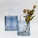 blue glass hand bag vase