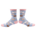 Pair of socks with boobies on a light blue background
