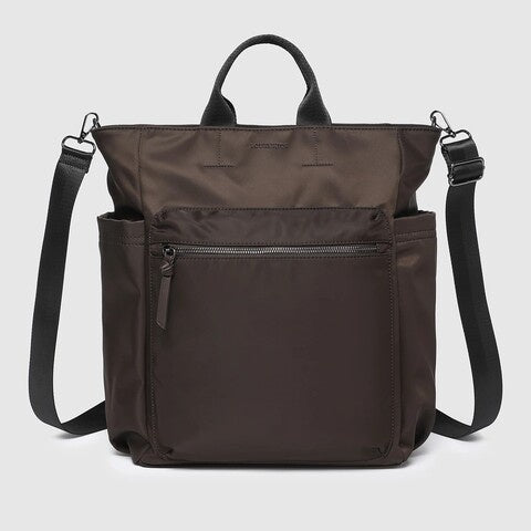 Brown backpack with multiple pockets and straps bronx louenhide