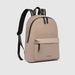 Beige backpack with black accents 