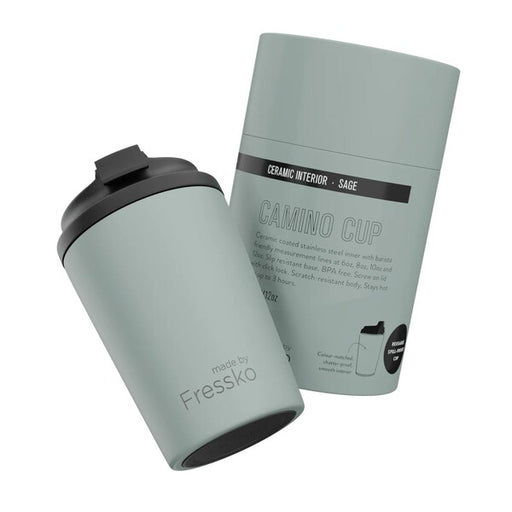Sage green travel mug with black lid and 'made by Fressko'