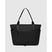 louenhide black tote back for travel on suitcase