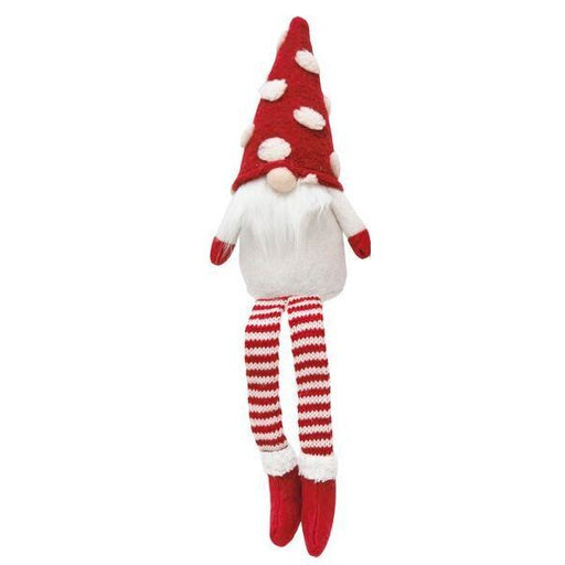 Red and white gnome figurine with a long beard  
