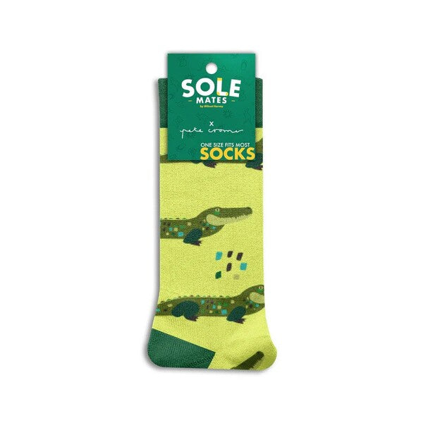 Green and yellow sock with alligator design 