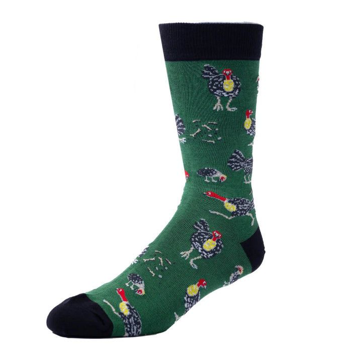 Green sock with rooster pattern on a white background