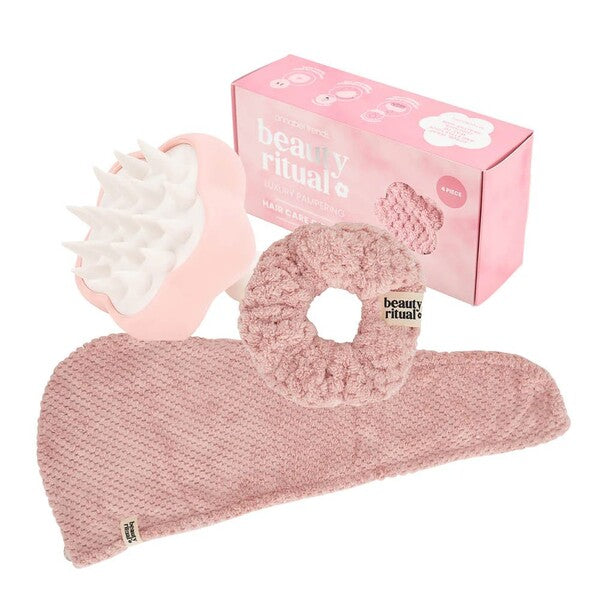 Pink hair care set with scrubber, scrunchie, and headband
