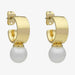 Gold hoop earrings with white spherical charms 