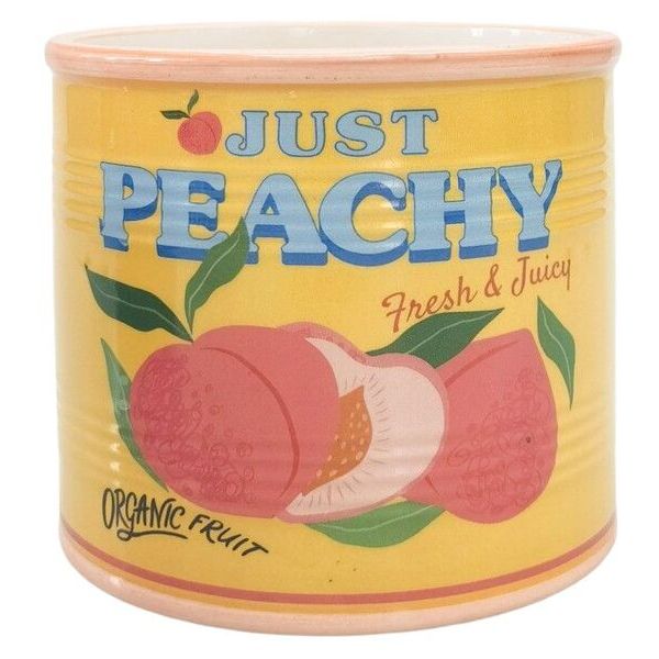 Ceramic pot with 'Just Peachy' design featuring peaches and leaves on a yellow background.