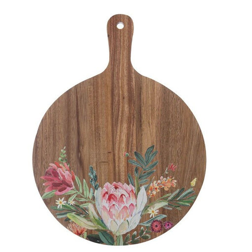 Round wooden cutting board with floral design  