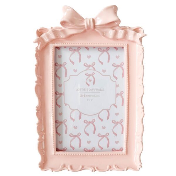 Pink decorative photo frame with a bow 