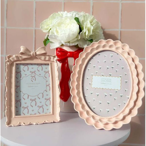 Two decorative picture frames for photos