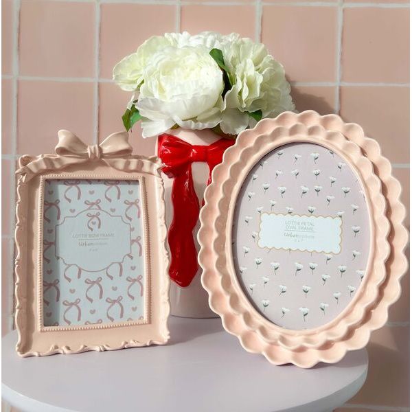 Two decorative picture frames for photos