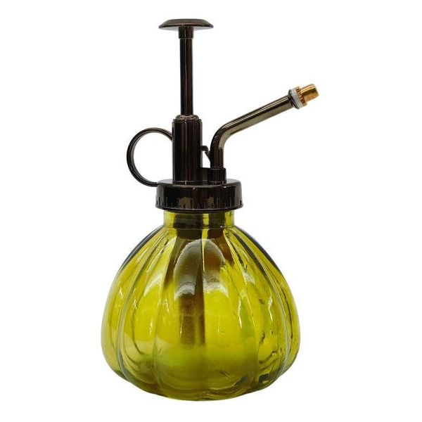 green glass plant sprayer