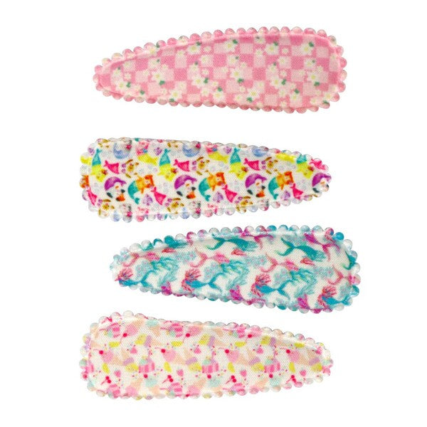 Set of four colourful hair clips with floral and unicorn patterns