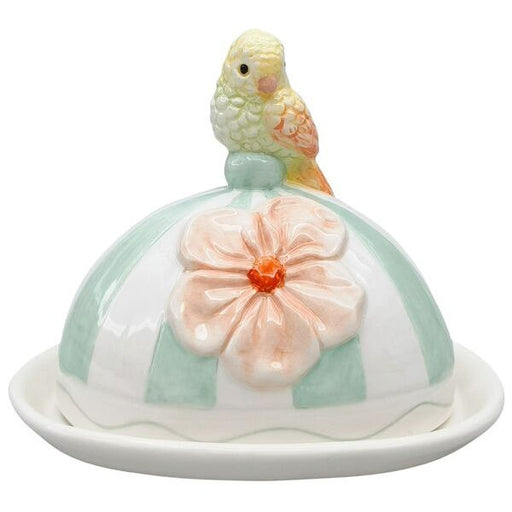 Butter dish with a parrot design 