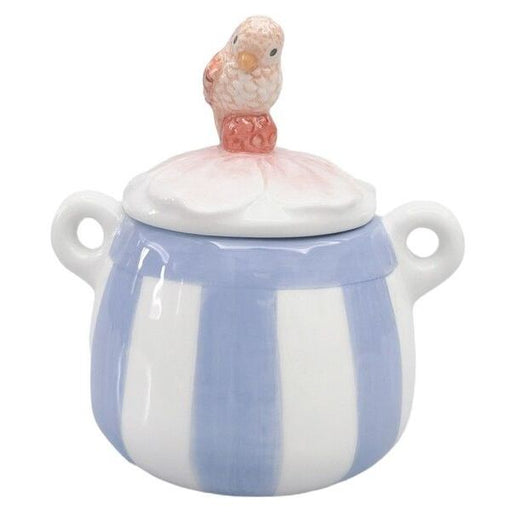 Ceramic sugar bowl with a striped design and a bird figurine on top