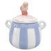 Ceramic sugar bowl with a striped design and a bird figurine on top