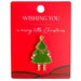 Green Christmas tree pin on a red card with 'Wishing You a Merry Little Christmas' text