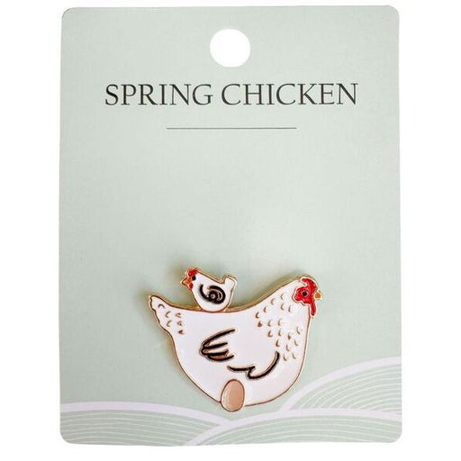 Chicken-shaped brooch on a 'Spring Chicken' card 
