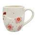 Ceramic mug with floral design and chicken illustration 