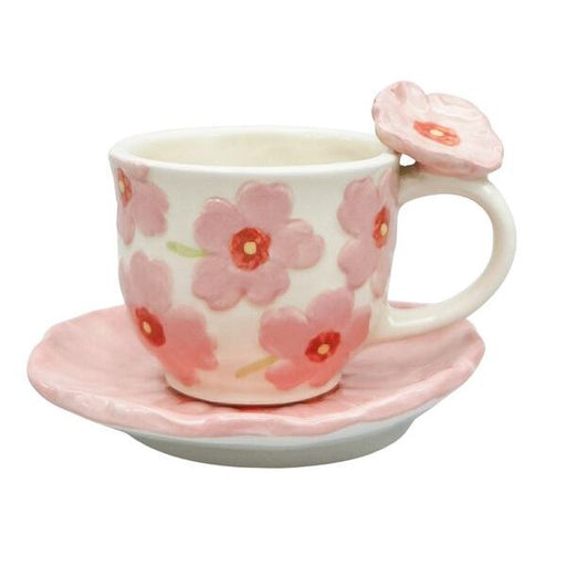 Ceramic cup and saucer with floral design