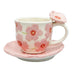 Ceramic cup and saucer with floral design