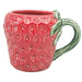 Red ceramic mug shaped like a strawberry with a green handle 