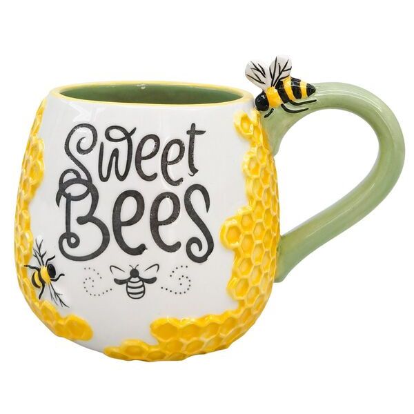 Mug with honeycomb design and bee decorations, featuring the text 'Sweet Bees'.