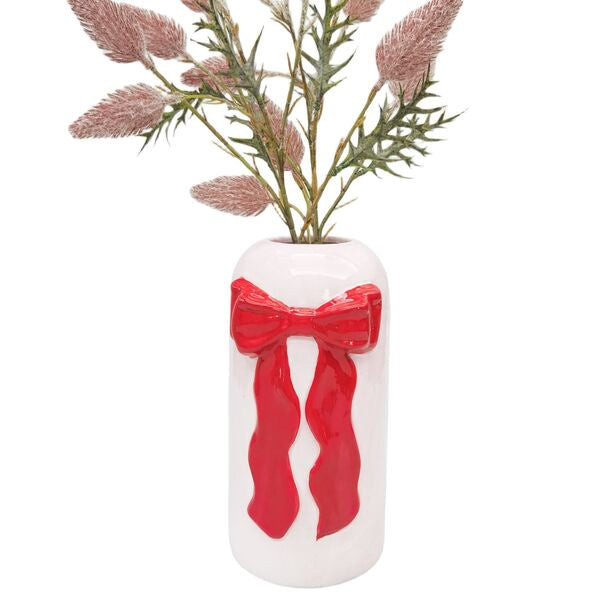 Decorative vase with a red bow 