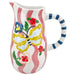 Decorative ceramic pitcher with butterfly and floral design