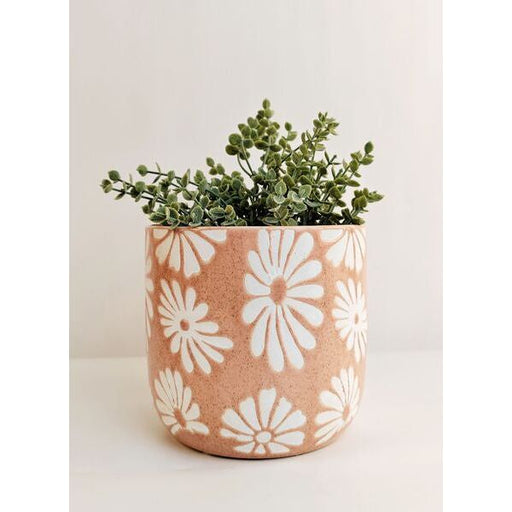 Plant pot in light pink with daisy design 