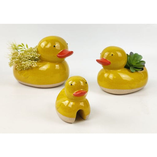 duck yellow pots and pot hanger