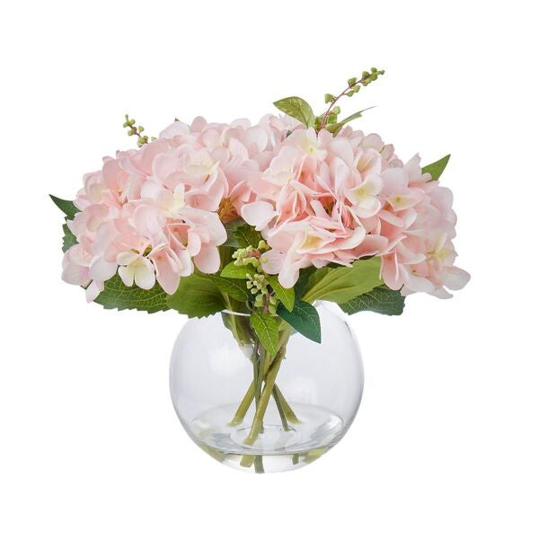 artificial hydrangea flowers in glass vase
