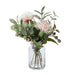rogue artificial flowers in glass vase  pin cushion floral mix