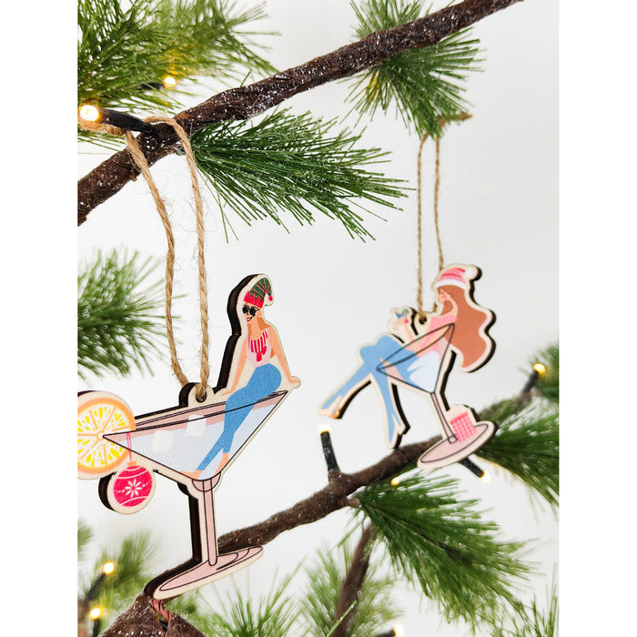 Quirky Christmas Girl Sitting Gin Hanging Decoration