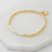gold beaded bracelet with pearls
